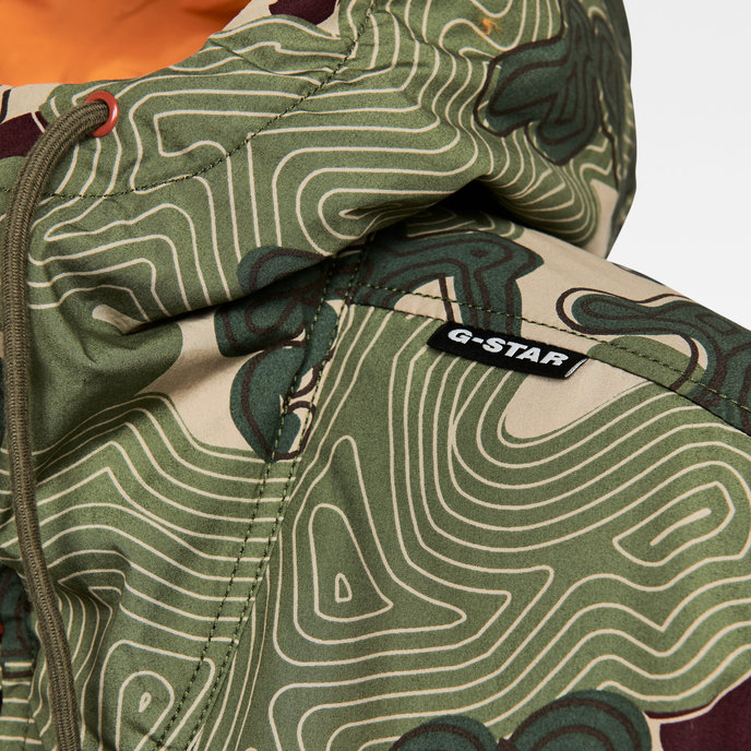 Reversible printed hooded jacket zelená